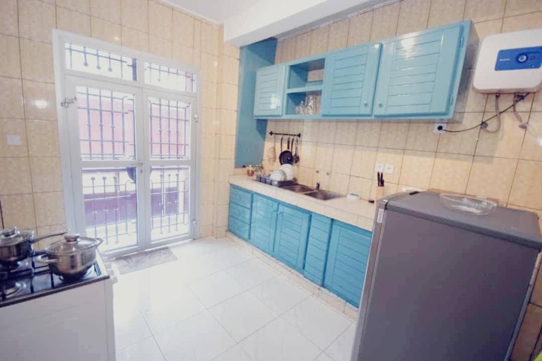 الشقق الفندقية Stone House - Makepe, دوالا المظهر الخارجي الصورة
